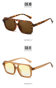Detail view of square pilot sunglasses in tortoiseshell and transparent tea colors