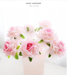 Pink artificial rose pen bouquet with white feathers and elegant lettering detail
