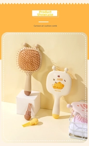 Detail of cute cartoon hair brush with massage cushion and cleaning claw tool