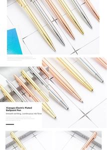 Detail view of electroplated metal ballpoint pens in gold, silver, and rose gold finishes