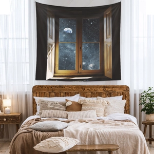 Detailed view of bohemian cosmic tapestry with a window view to space on a bedroom wall