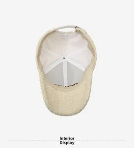Detail view of teddy wool baseball cap inner lining with metal adjustment buckle