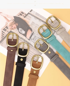 Collection of suede leather belts for women in multiple colors with gold oval buckles