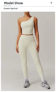 Ensemble de yoga asymétrique abricot crème avec legging taille haute et débardeur