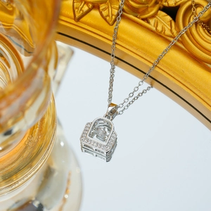 Titanium steel dancing zircon lock necklace with silver finish and sparkling pendant