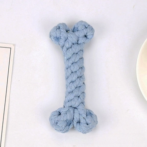 Detailed view of durable light blue cotton rope dog toy in a woven bone shape