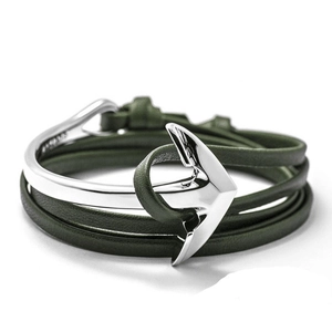 Detail of silver anchor clasp and multi-layer olive green leather wrap bracelet