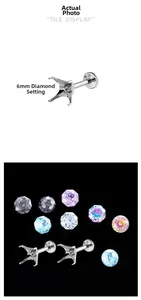 Detailed view of 6mm F136 titanium four-prong setting and colorful cubic zirconia stones