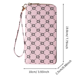 Portefeuille long rose pour femme avec motif géométrique, dragonne et fermeture éclair
