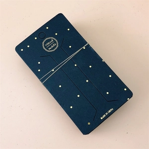 Premium navy blue paper display card for necklaces with gold foil dots and hang hole