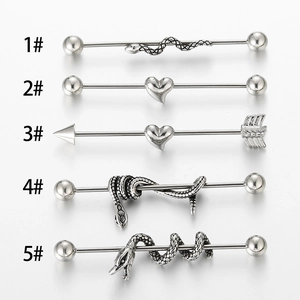 Industrial barbell earring set with heart and serpent designs in stainless steel