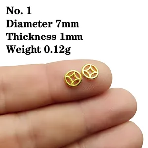 Macro shot of 7mm hollow coin spacers in gold finish for DIY jewelry making