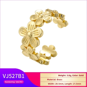 Macro shot of gold brass five-petal daisy flower open ring with dimensions and specs