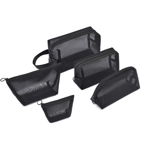5-piece set of black breathable mesh travel storage bags in various shapes and sizes