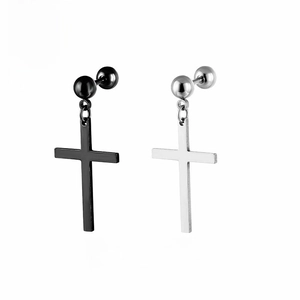 Close-up of cross pendant earrings in polished silver and matte black steel finish