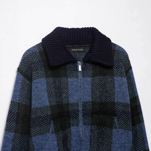 Retro blue and black plaid knit jacket with zipper and ribbed collar detail