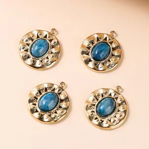 Natural lapis lazuli stone pendant set in a vintage golden sunburst stainless steel base