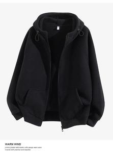 Detail of black fleece hooded jacket featuring a full zipper, drawstring, and elastic cuffs