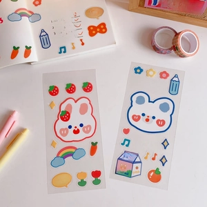 Close-up of cute Japanese style PET stickers with bear and strawberry patterns