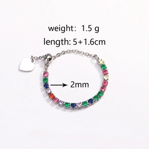 Macro shot of colorful zircon chain ring with adjustable toggle and heart charm