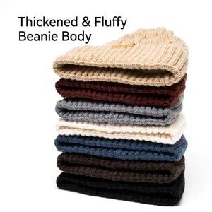 Vertical stack of thick knit winter beanies in seven colors with leather logo patch