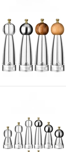 Detailed comparison of manual pepper grinders in acrylic, stainless steel, and acacia wood