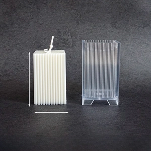 Detail of 8.5x5cm square ribbed candle mold and vertical striped wax candle