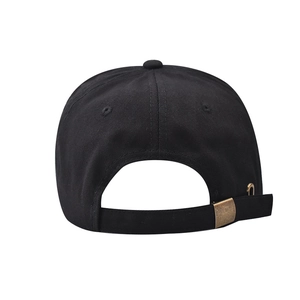 Detail view of black cotton baseball cap with adjustable metal strap buckle