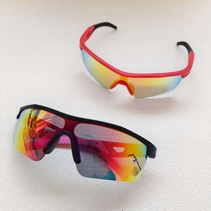 Kids sports cycling sunglasses in black and red with colorful mirrored lenses