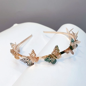 Elegant 3D hollow gold butterfly headband crafted with premium alloy metal for women