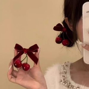 Elegant red velvet bow hair clip with cherry charms and sweet vintage aesthetic for women