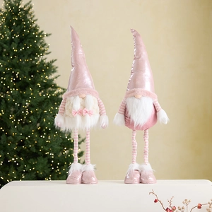 Pink and white Christmas gnomes with telescopic legs and glowing lights for festive decor