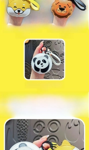 Detail showing handcrafted leather animal keychains with stitching for shiba and panda