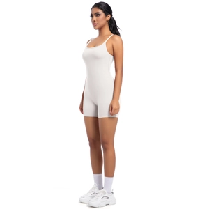 Side view of cream white athletic bodysuit with spaghetti straps and bodycon fit