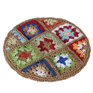 Handmade crochet beret featuring bohemian multi-color patchwork and summer straw knit design