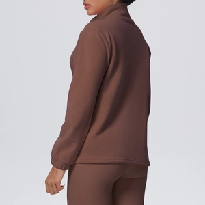 Close-up back view of brown fleece-lined stand collar sports jacket and leggings set