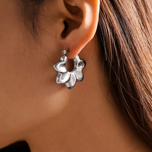 Silver wavy petal hollow hoop earrings in 18K gold plated titanium steel for women