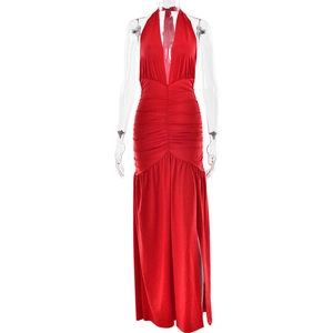 Detail showing the deep V-neck, ruched waist, and high slit of the red shimmering dress