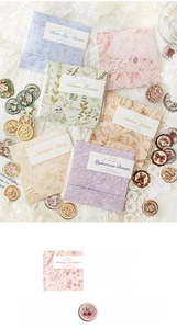 Detail of embossed floral paper stickers with vintage letterpress textures for decoration