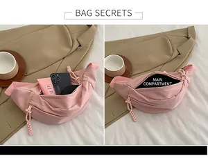 Internal view of pink crescent sling bag showing large capacity for daily essentials
