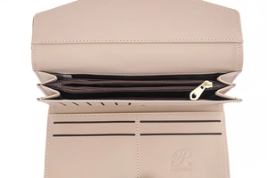 Close-up of beige PU leather wallet interior with card slots and heart zipper pull