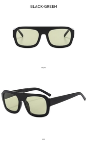 Front and side views of chunky black square sunglasses with light green transparent lenses