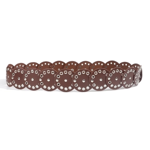 Detailed view of a brown vintage leather belt featuring unique round hollow metal eyelets
