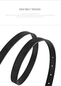 Artistic coil of a black leather belt with detailed stitching on a clean white background