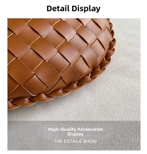 Close-up of brown leather intrecciato weave detail showcasing premium craftsmanship