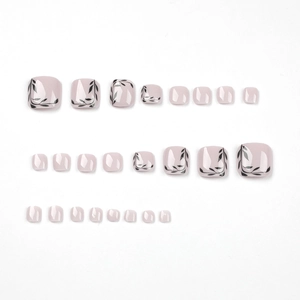 Pale pink press-on toenails with minimalist black leaf patterns on square oval tips