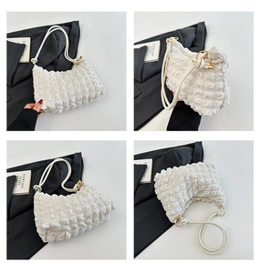 Multi-angle views of white popcorn texture shoulder bag with stylish ruched design