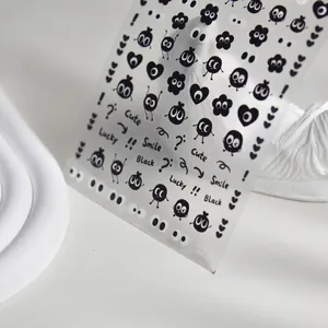 Autocollants à ongles emoji noir mignons avec yeux et cœurs pour nail art créatif