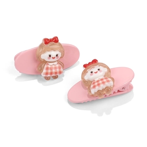 Pair of cute pink duckbill hair clips featuring cartoon resin girl figures on white background