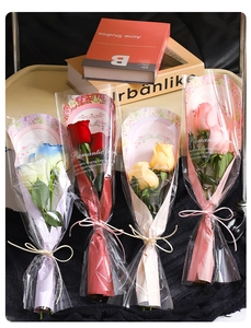 Single rose soap flower bouquets in red, yellow, pink and blue with romantic floral wrap